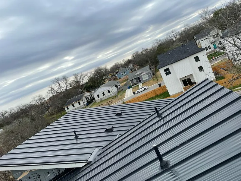 Standing seam metal roof panels with vents for Skylight Repair in Clifton Park